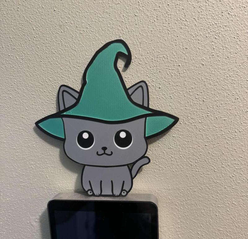 Cat in a witch hat Halloween decor 