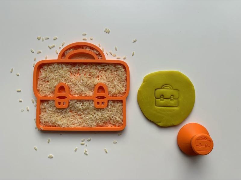 School bag stamp and tray