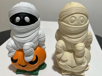 mummy on pumpkin