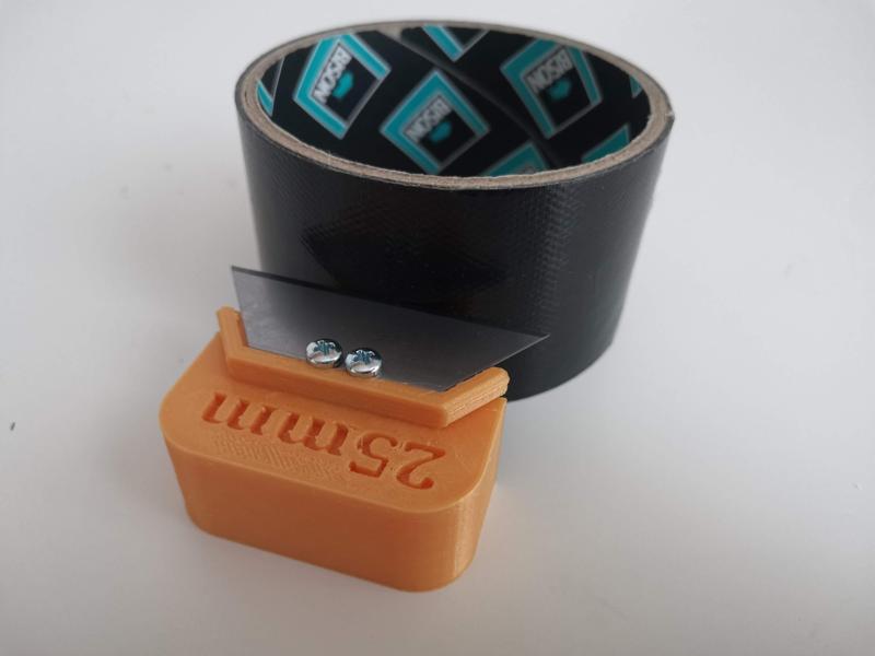 Tape cutter jig for bike tubeless setup