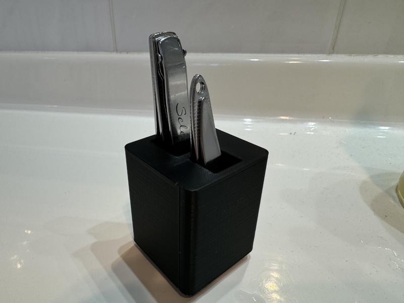 Nail clipper holder