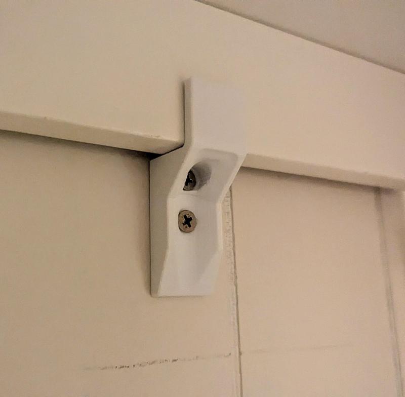 Furniture Securing Tab