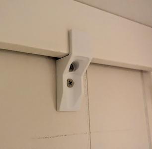 Furniture Securing Tab