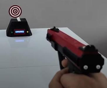 Shooting a moving target with a laser gun game