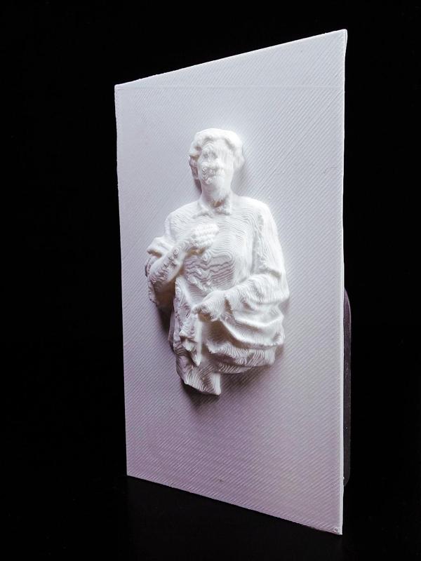 Gravestone Depicting Relief of a Man