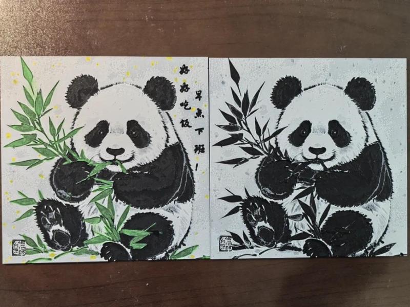 Panda eating bamboo, black and white