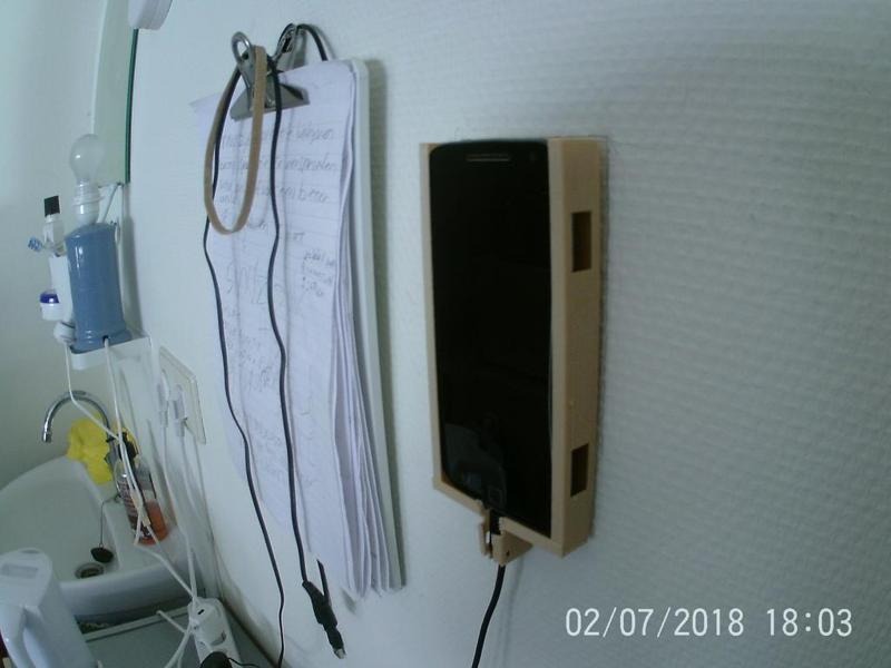 Phone holder on the wall