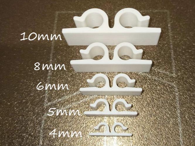 Strong dual cable clips