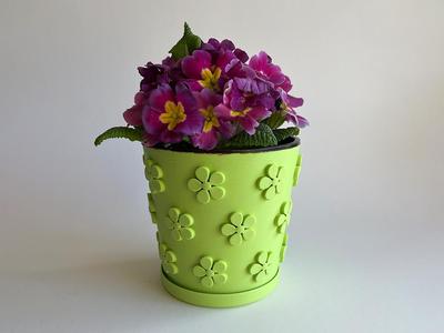 Cute pot with small flowers for kids room