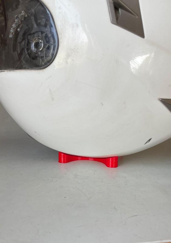 Motorcycle helmet holder