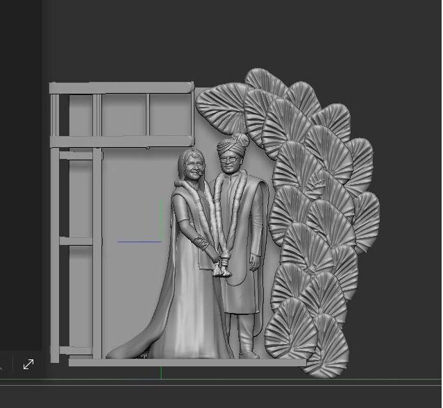 wedding couple with decorative wall