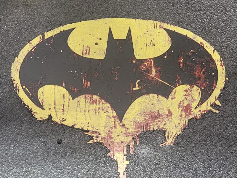 batman logo damaged