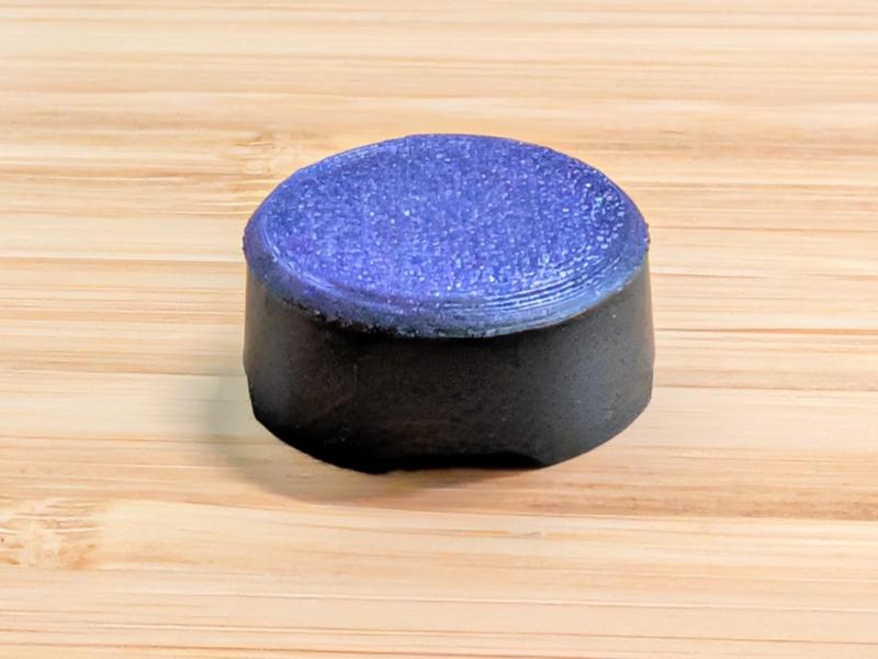 Sworl button cap