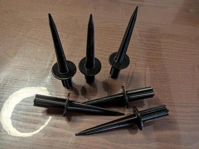 Volleyball net poles spikes