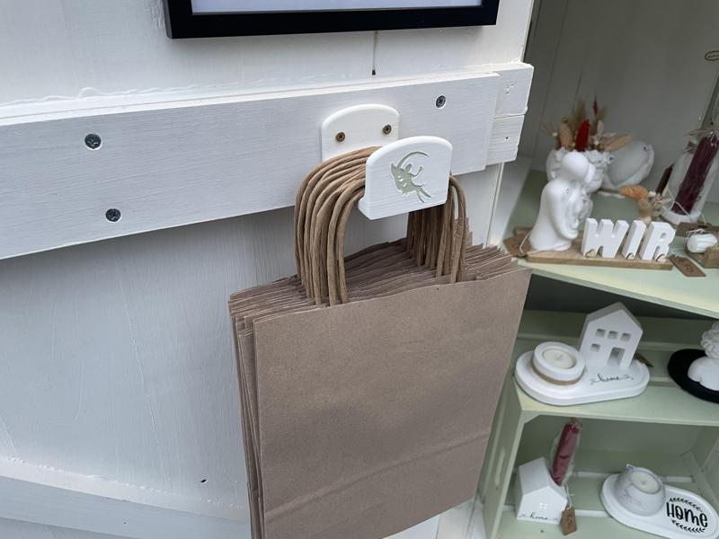 Paperbag-Holder with swappable Cover