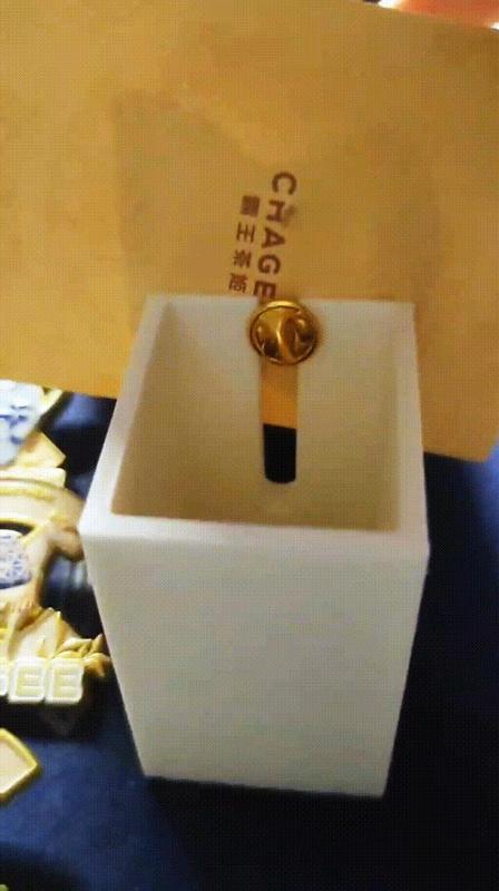 Metal badge back buckle removal tool