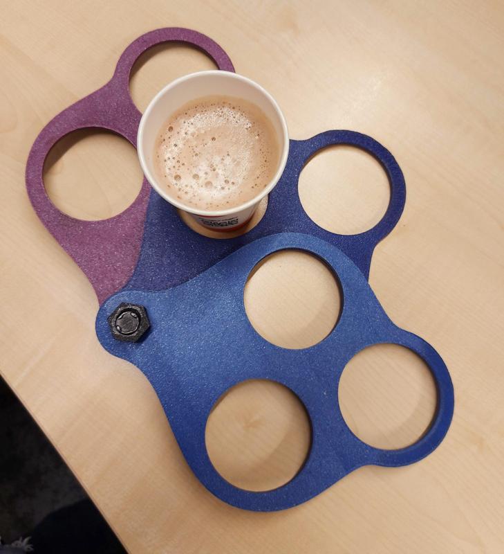 Coffee cup holder for nine cups.