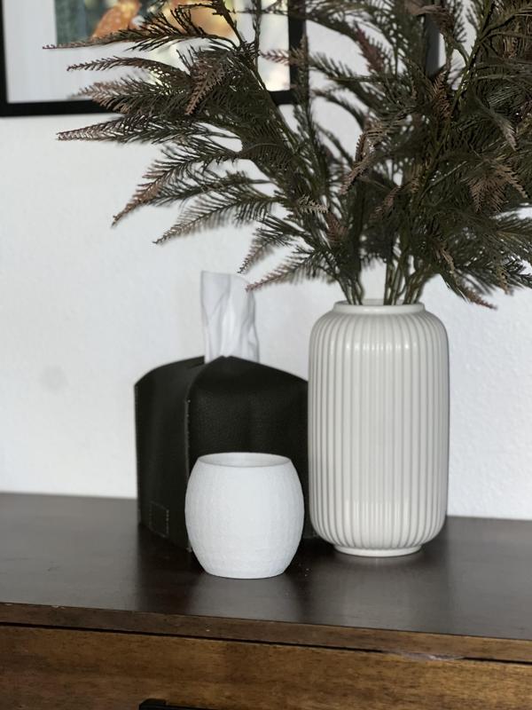Modern round vases available in 3 different sizes.
