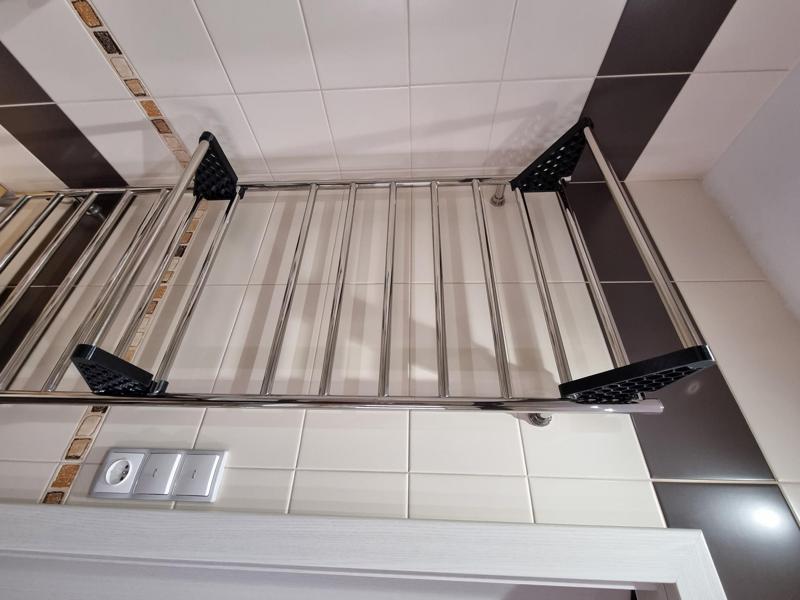Extension for towel rail radiators