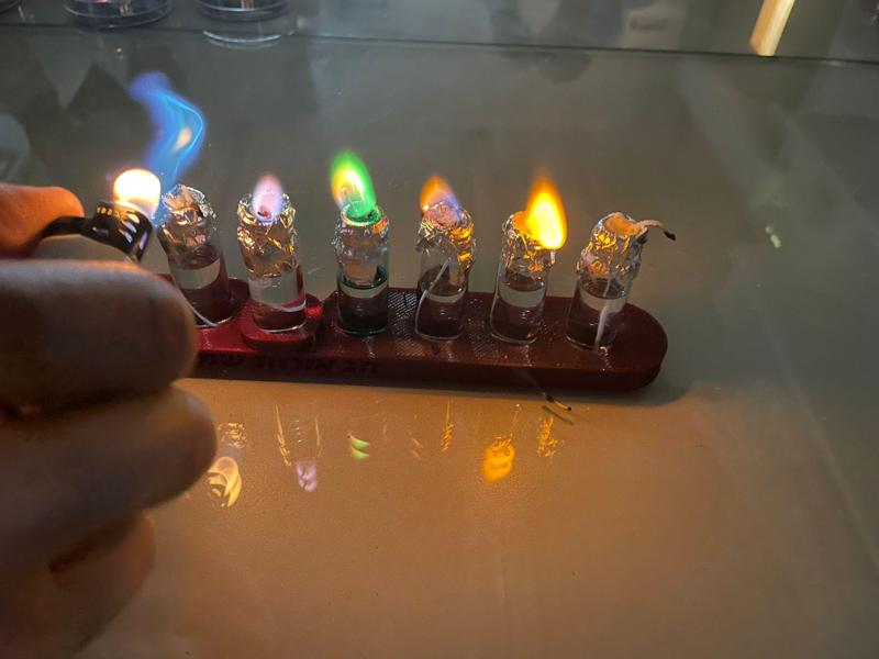 Chemical hanukkiah with colorful flames