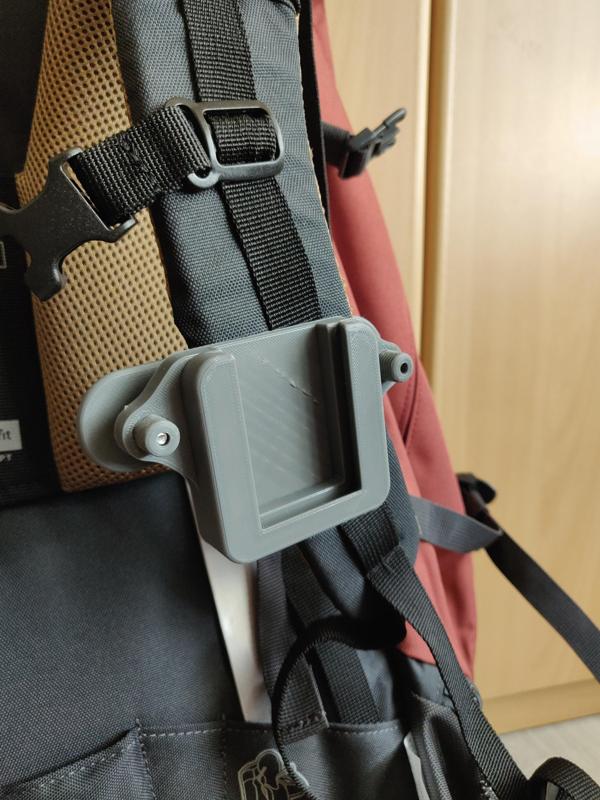 Backpack camera attachment system