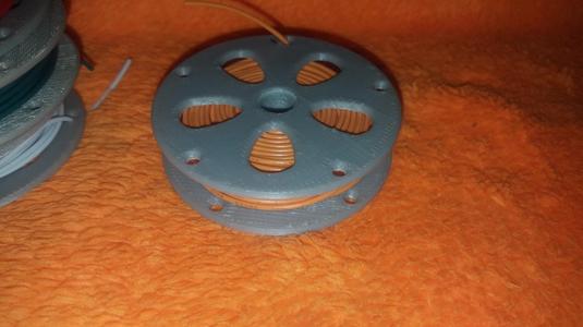 Wire spool holder.