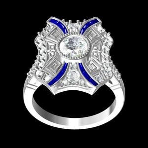 Round Diamond Bezel and Blue Sapphire Baguette Cocktail Ring