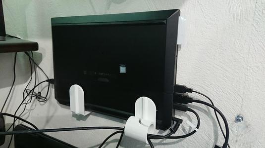 Laptop wall hanger