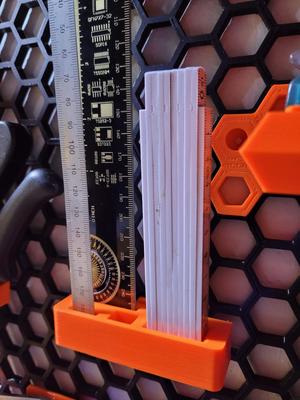 Ruler and folding tape measure holder for HoneyCombWall