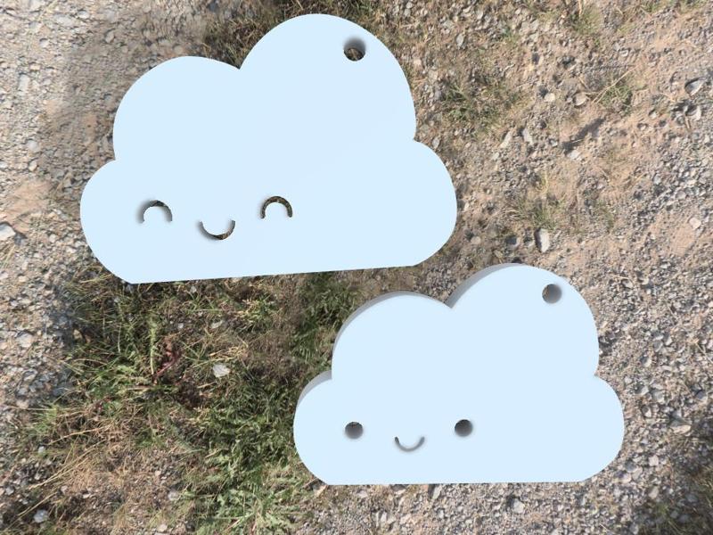 keychain in the shape of a nuve for couples