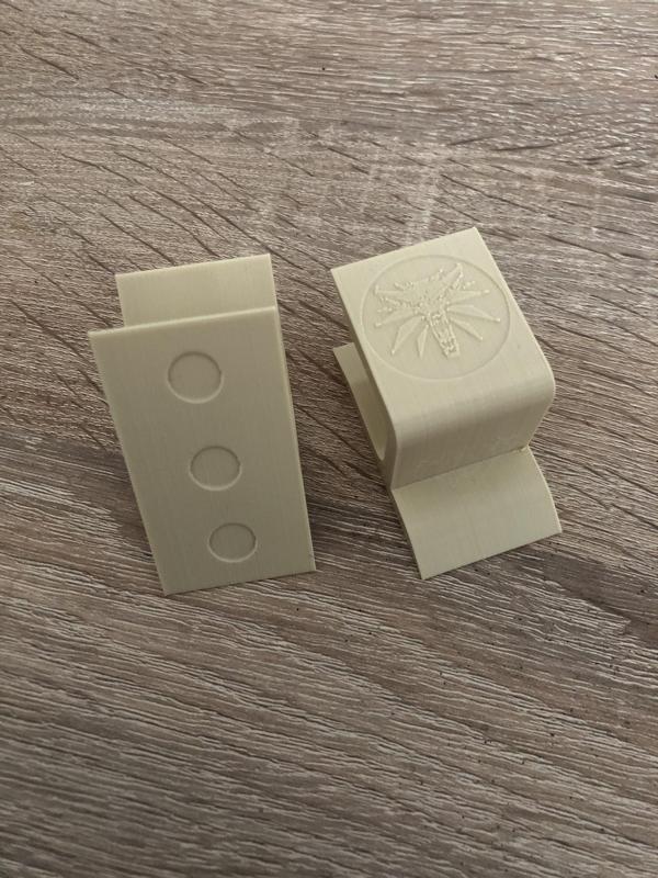Wall-mounted cap holder