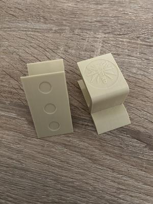 Wall-mounted cap holder