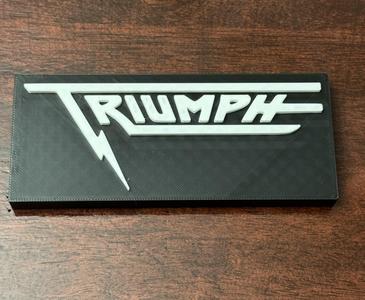Triumph Band Sign