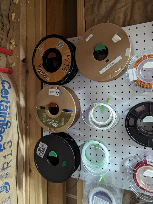 Large filament reel holder for pegboard