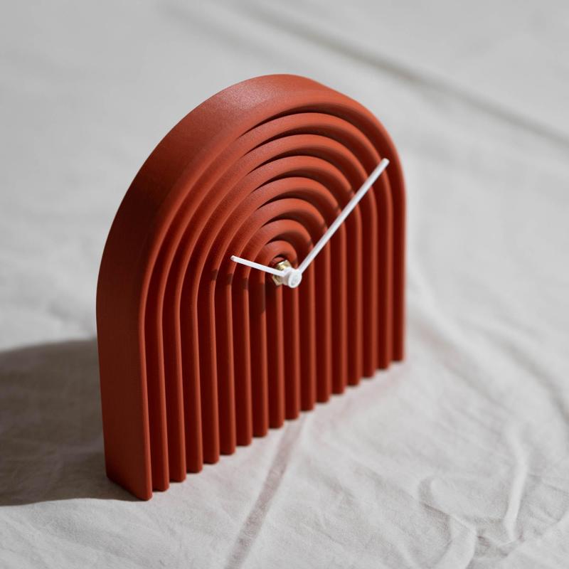 Curly standing clock