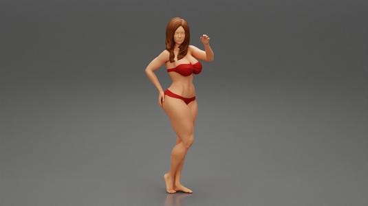 Sexy woman wearing bikini posing at the beach.stl