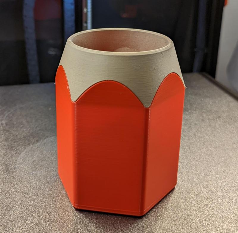 Simple two part pencil holder.