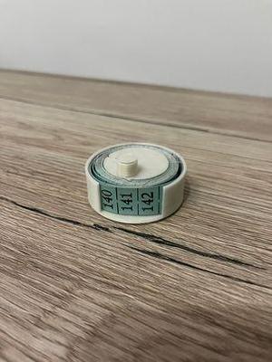 Soft tape measure spool