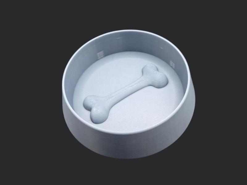 Dog bowl with dog bone 