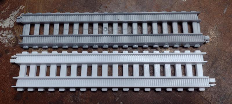 Straight train track section