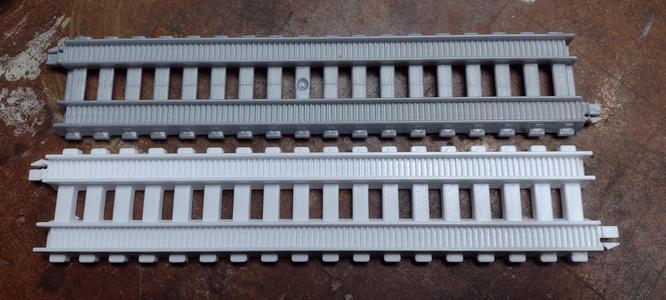 Straight train track section