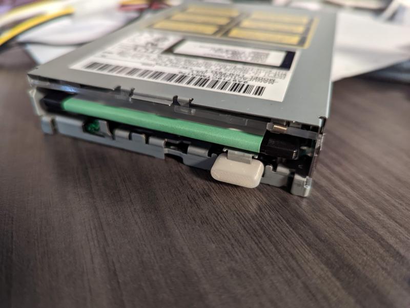 LS 120 / SuperDisk manual eject button (Matsushita / Imation)