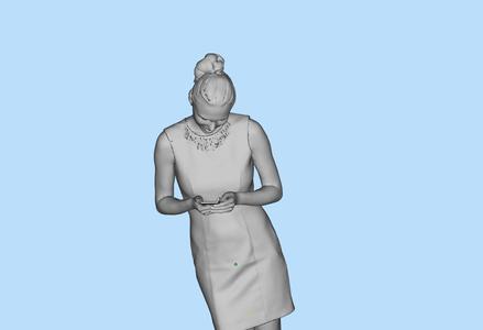 Girl in short skirt playing with mobile phone