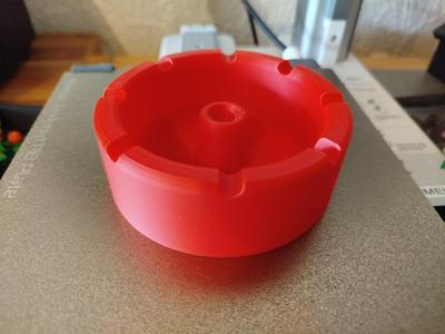 Ashtray with ember killer