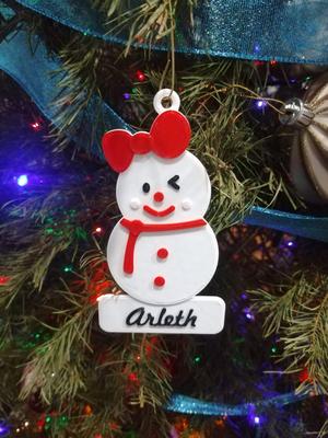Christmas tree decoration in the shape of snowman with bow tie
