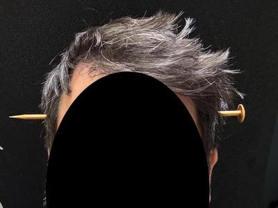 Nail in the head illusion