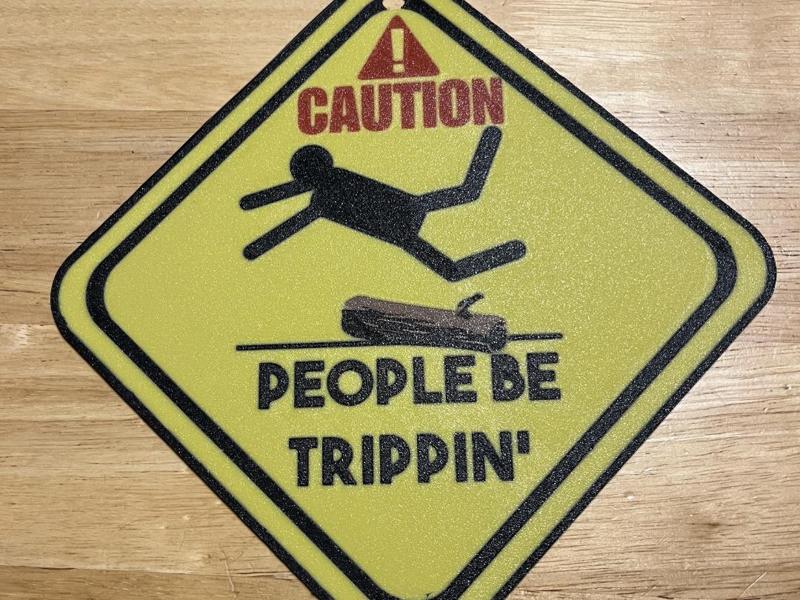 People be trippin' sign
