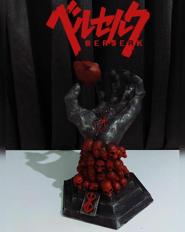 berserk hand of god holding behelit
