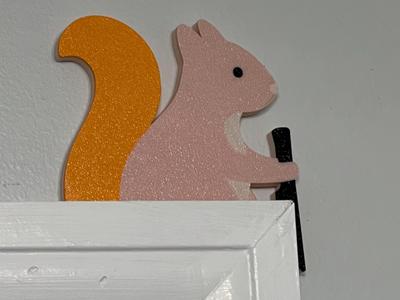 Squirrel holding a knife