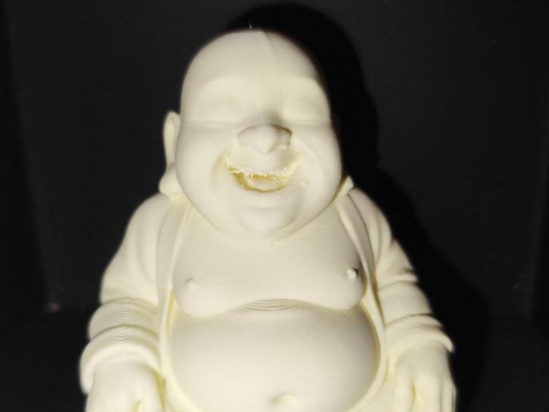 Seated Buddha, joyful